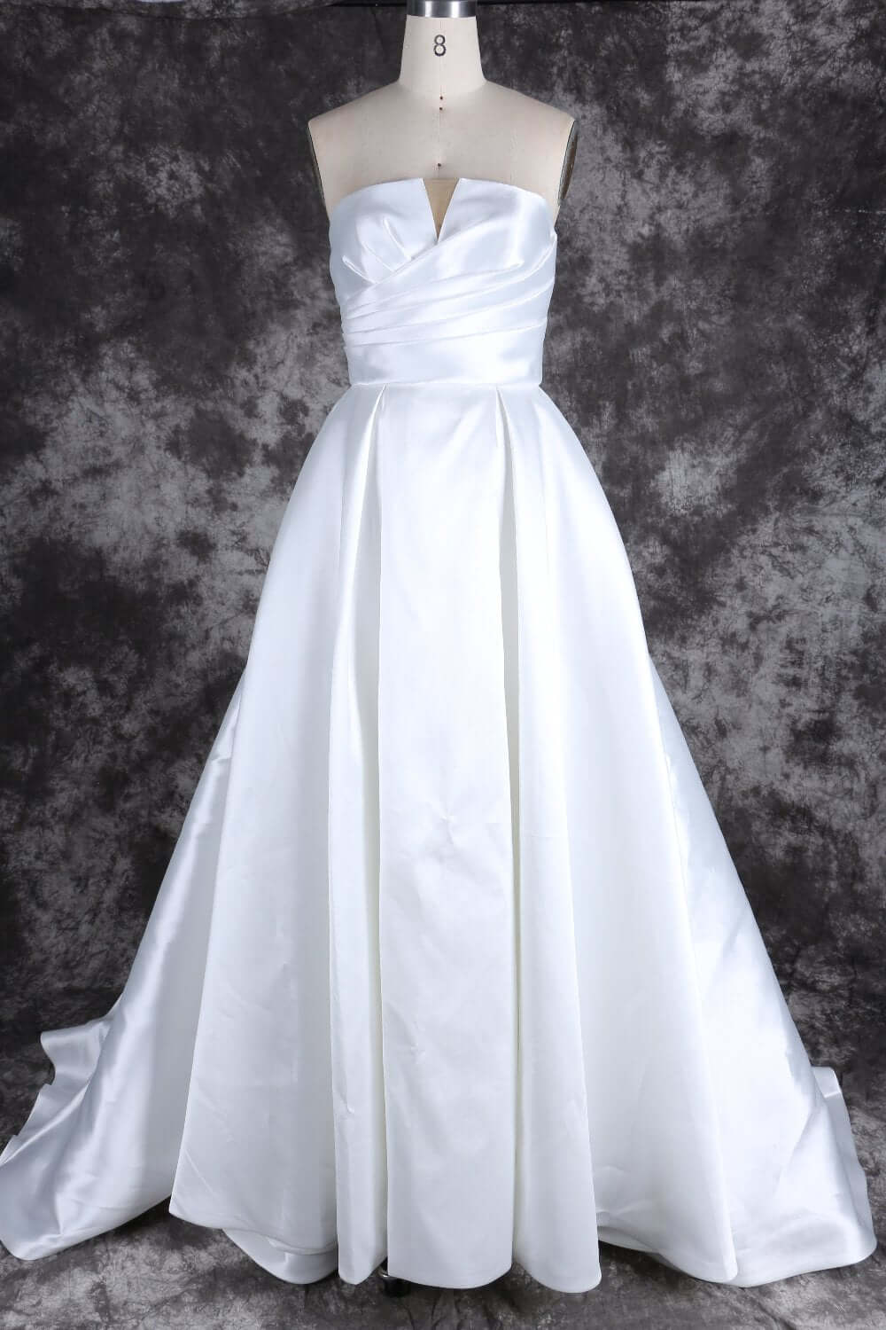 Bridal gown with sweetheart neckline and slit